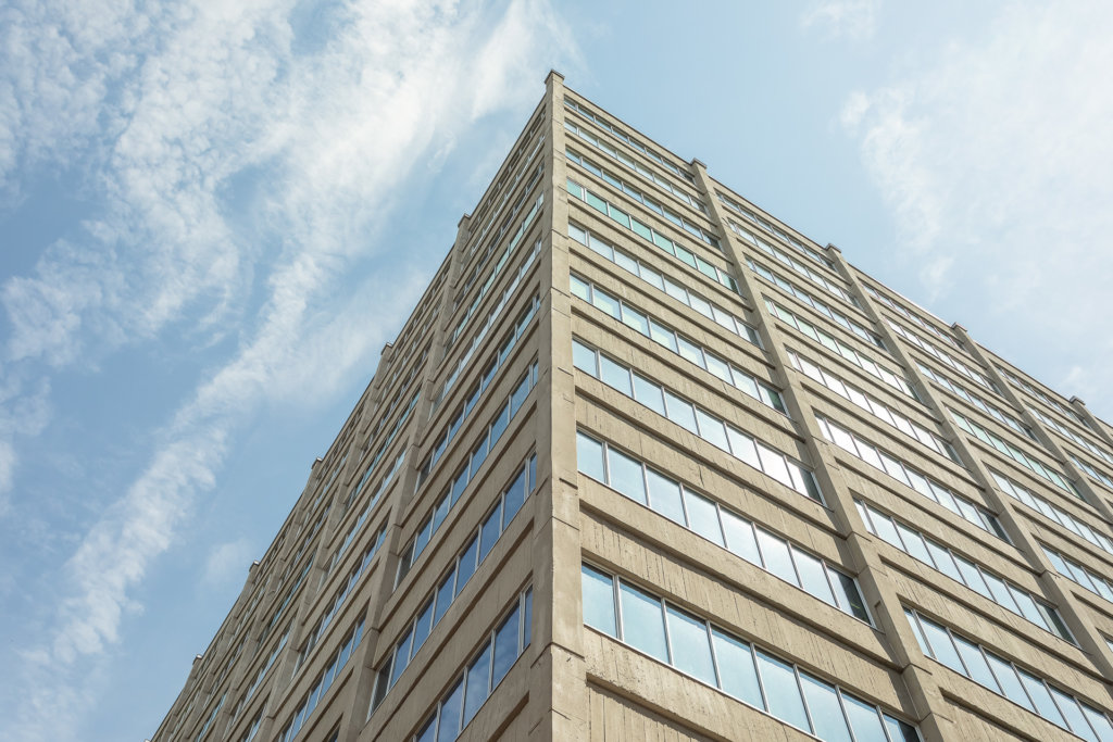 Réparation-Façades-Béton-extérieur-enduit-cimentaire-Montréal